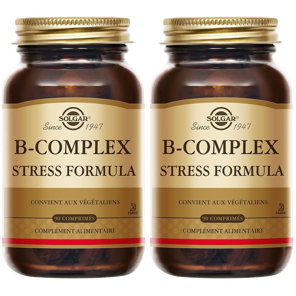 Deux flacons en verre brun avec des couvercles dorés. L'étiquette indique "SOLGAR B-Complex Stress Formula".
