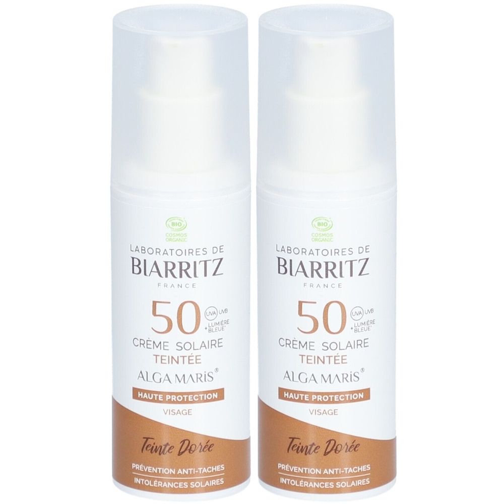 Deux flacons de crème solaire. Corps blanc, base marron. Inscription: Laboratoires de Biarritz, 50, Crème Solaire Teintée, Alga Maris.