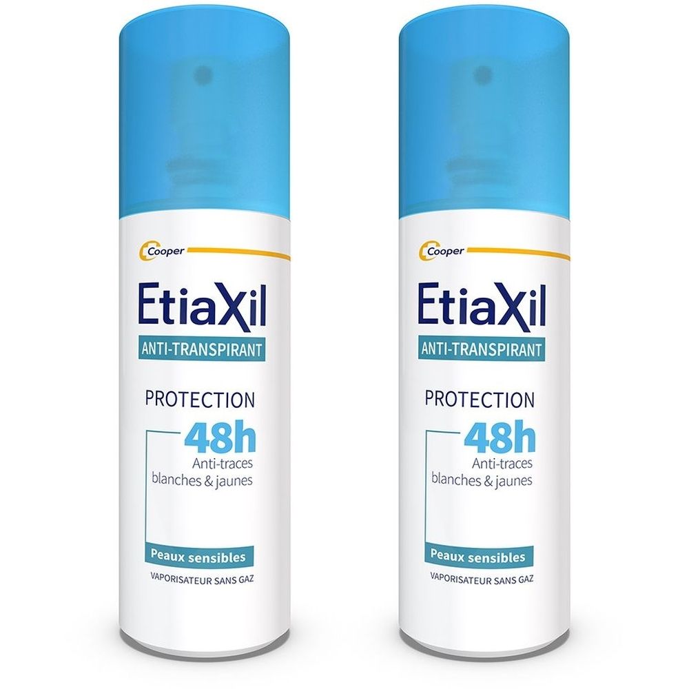 Deux sprays blancs avec bouchon bleu. Inscription Etiaxil, anti-transpirant, protection 48h, peaux sensibles.