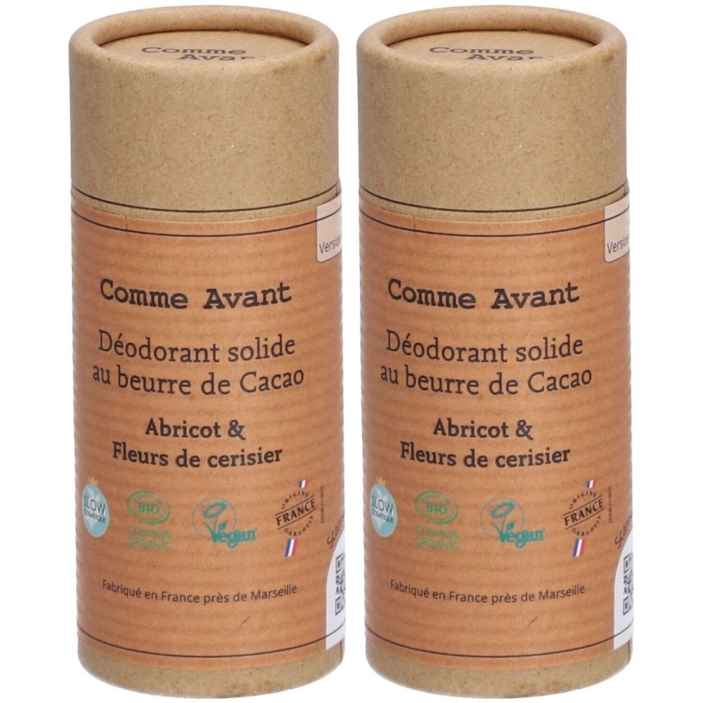 Zwei zylindrische Behälter. Aufschrift: Comme Avant, Déodorant solide au beurre de Cacao, Abricot & Fleurs de cerisier. Mit Bio-Siegeln und Vegan-Logo.