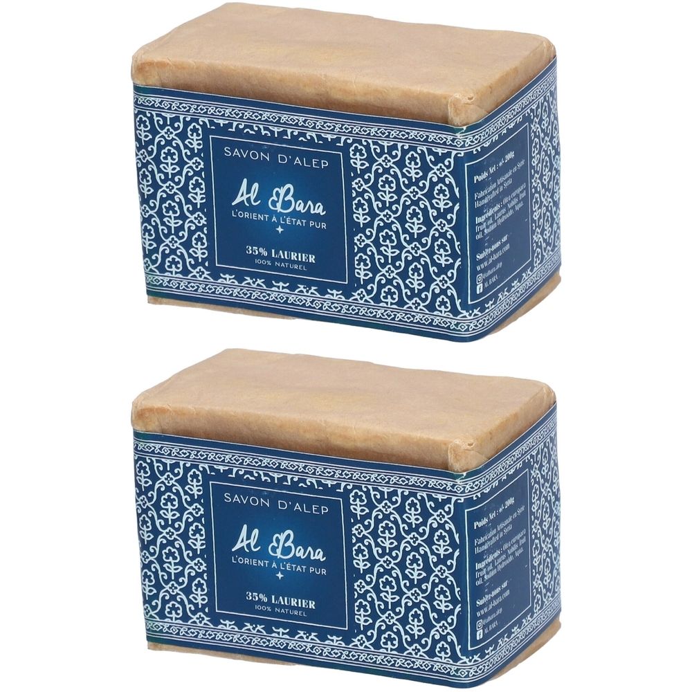 Deux savons rectangulaires avec emballage bleu et blanc. Inscription: SAVON D'ALEP, Al Bara, 35% LAURIER.