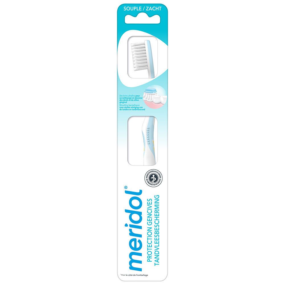 Brosse à dents dans un emballage blister. Tête blanche, manche bleu. Logo "meridol" et indication "Protection Gencives".