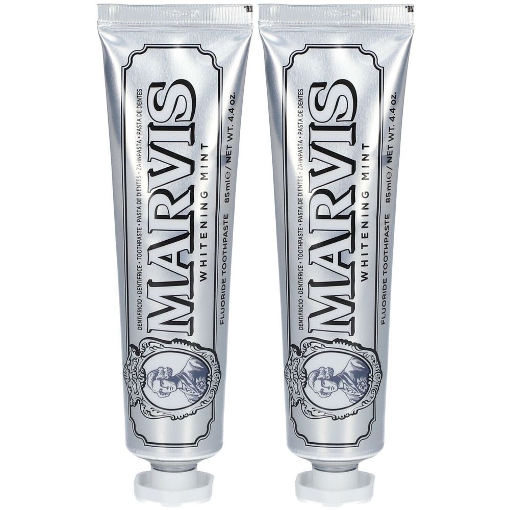 Deux tubes de dentifrice MARVIS Whitening Mint. Tubes argentés avec texte noir. Contient 85 ml.