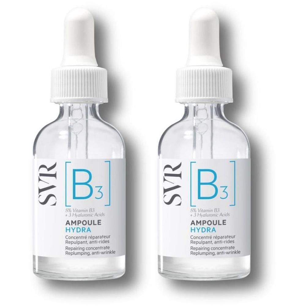 Deux flacons SVR [B3] Ampoule Hydra avec pipette. Flacons en verre transparent avec étiquette blanche et texte bleu. Pipette blanche.