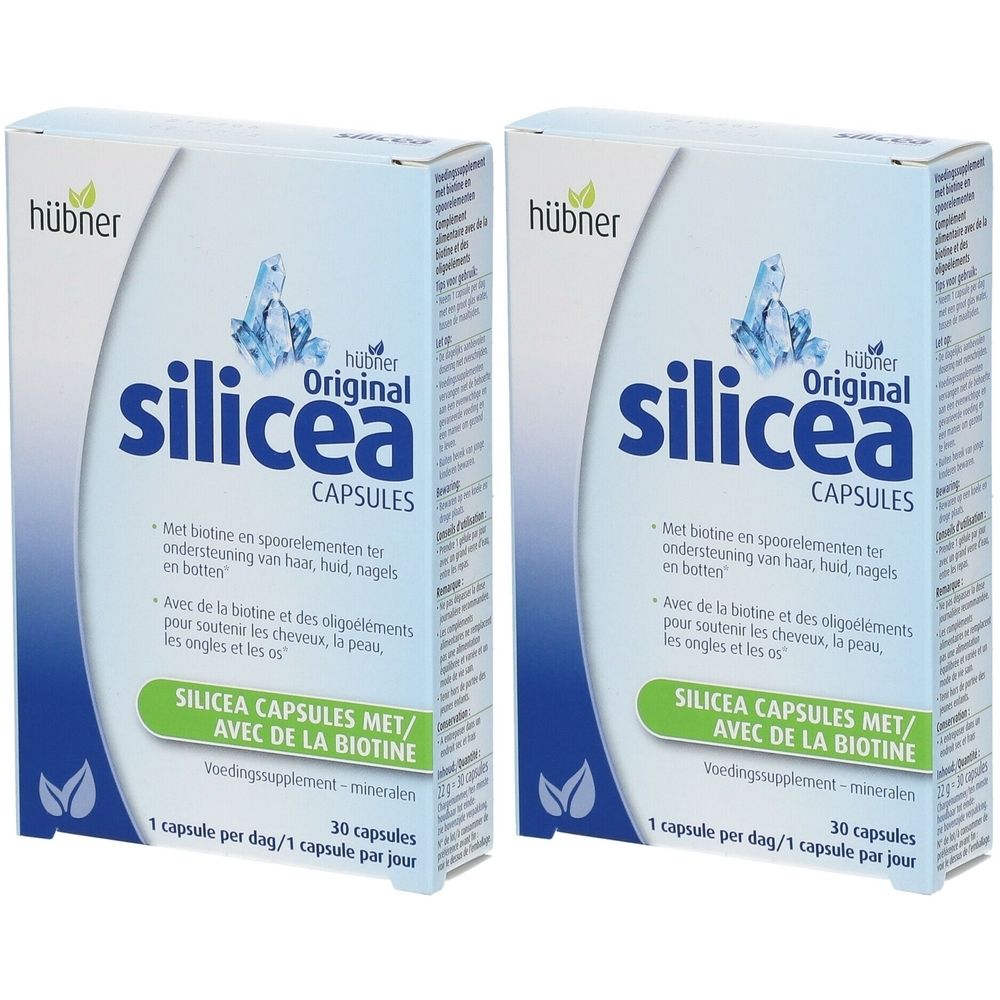 Deux boîtes de Hübner Original Silicea Capsules. Emballage blanc avec texte bleu et informations sur le produit. 30 capsules par boîte.