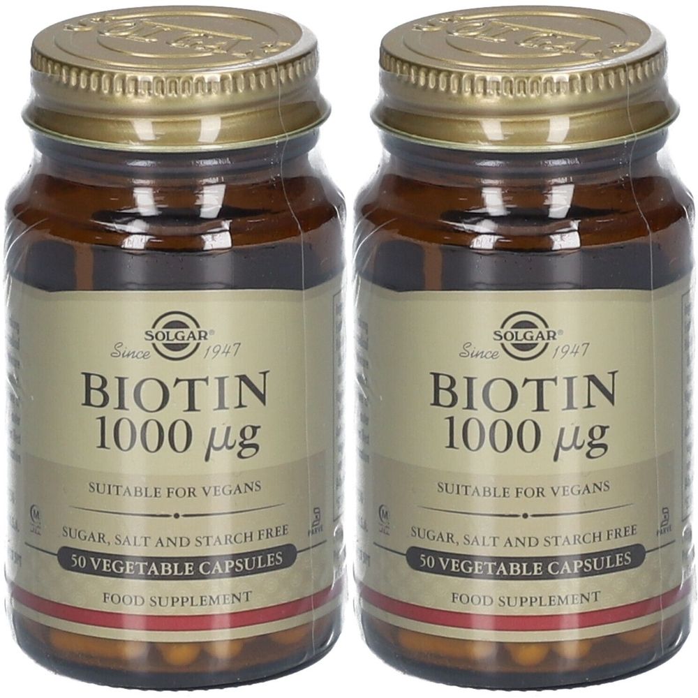 Zwei Flaschen mit SOLGAR Biotin 1000 µg. Braune Glasflaschen mit goldenen Deckeln. Aufschrift: Biotin 1000 µg, geeignet für Veganer, zucker-, salz- und stärkefrei.
