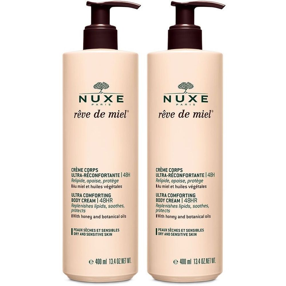 Zwei Flaschen NUXE Rêve de Miel Ultra-Komfort-Körpercreme. Beige Flaschen mit braunen Pumpköpfen. Text auf Französisch und Englisch.