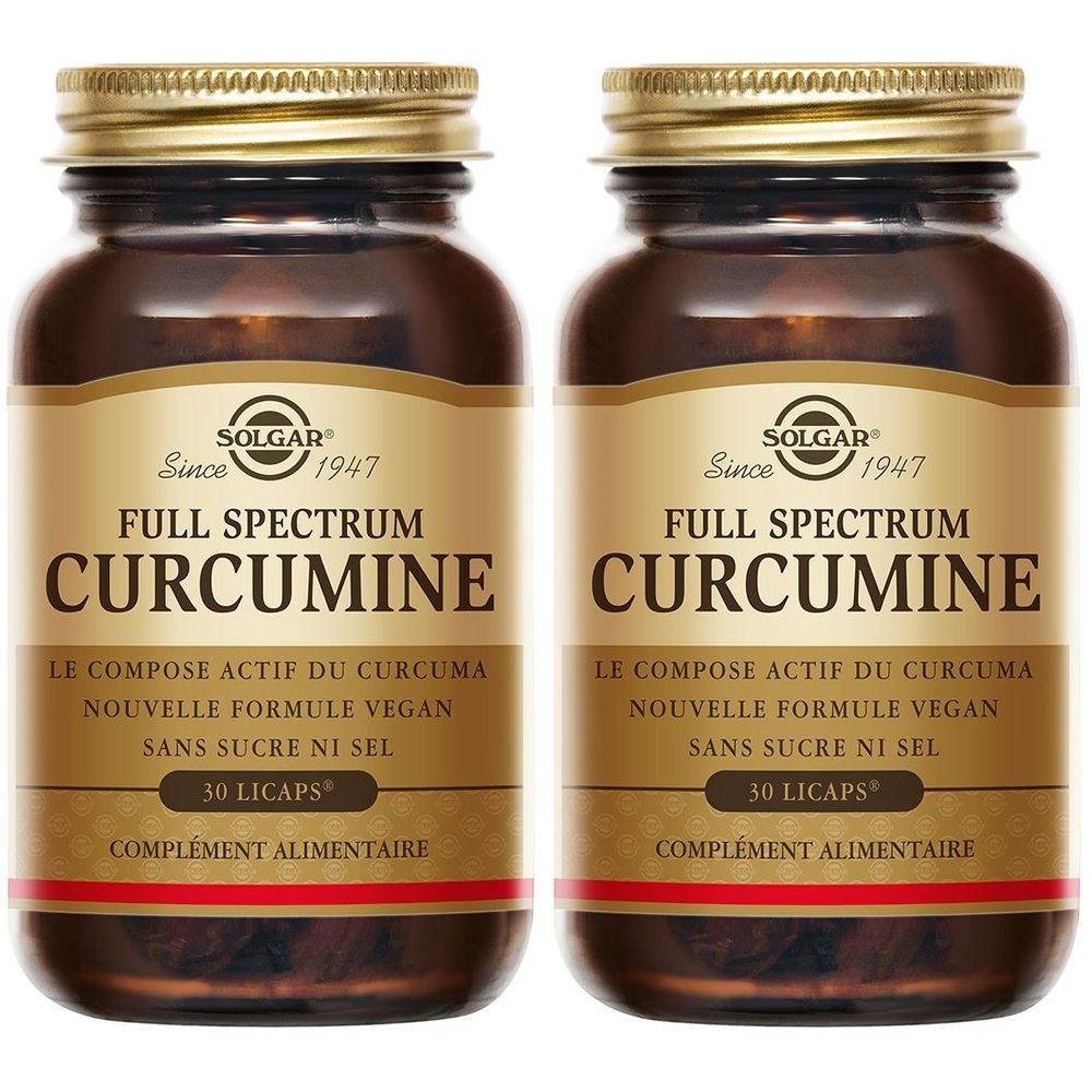 Deux flacons de SOLGAR Full Spectrum Curcumine. Flacons en verre brun avec bouchons et étiquettes dorées. Inscription : Curcumine, 30 Licaps.