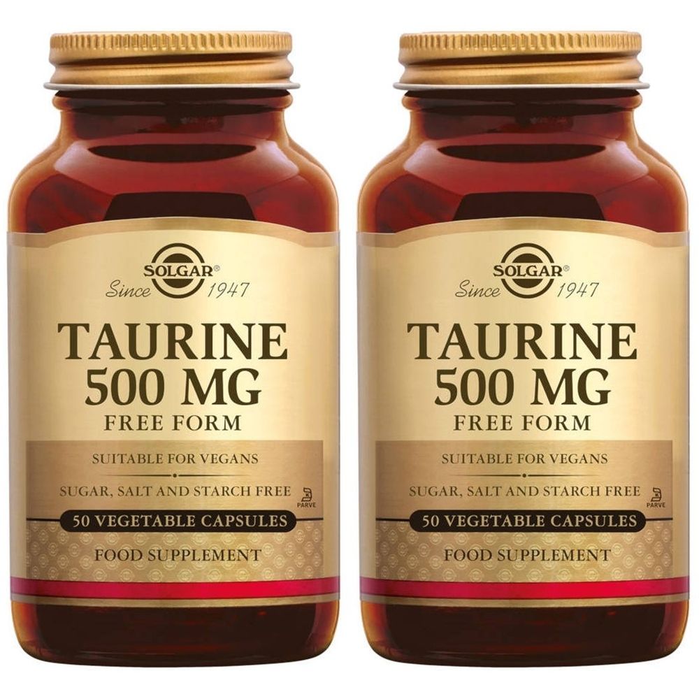 Zwei braune Glasflaschen mit goldenen Deckeln. Auf den Etiketten steht "Taurine 500 MG" und "50 Vegetable Capsules". Marke: Solgar.