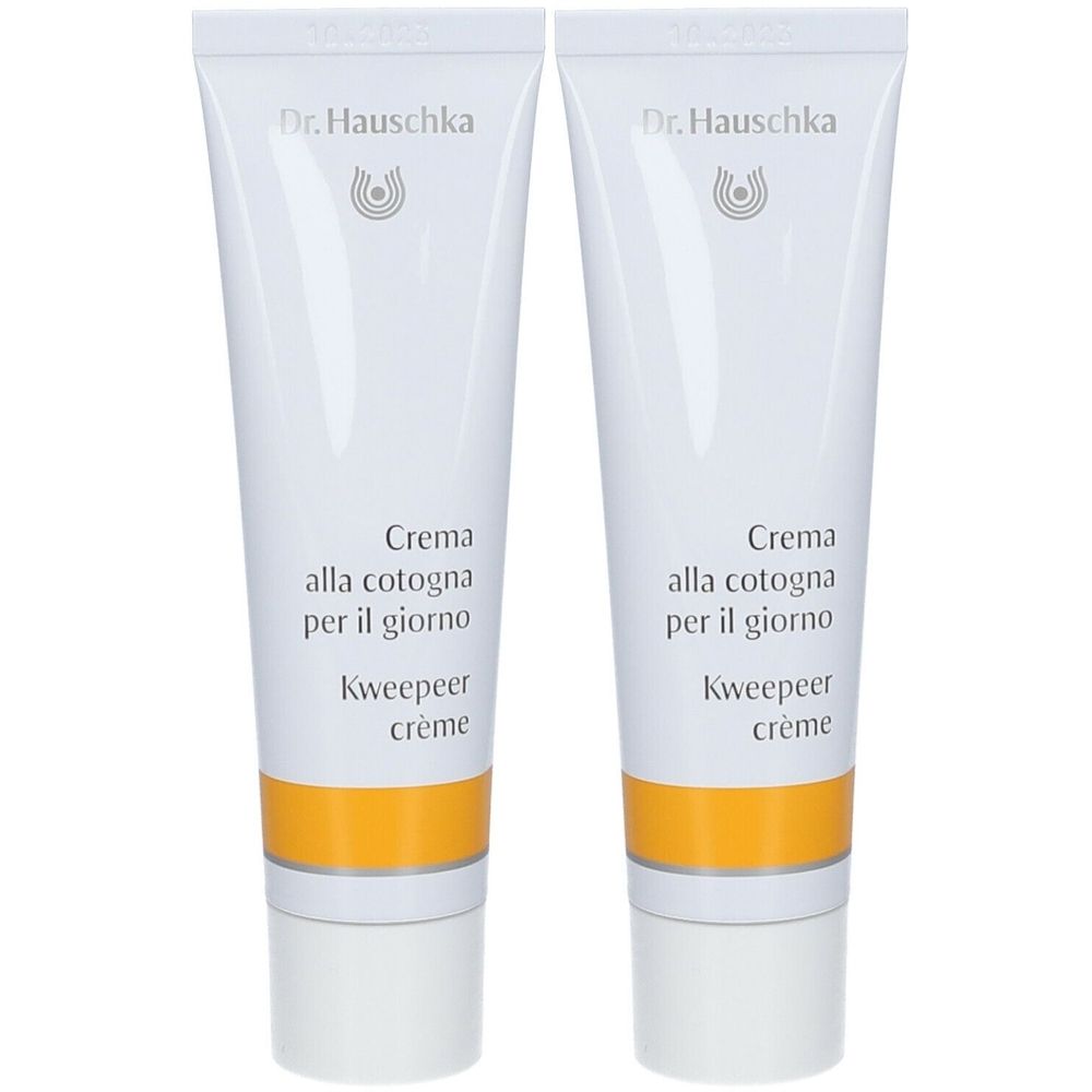 Zwei Tuben Creme. Weiße Tuben mit gelbem Streifen und Schriftzug. Marke: Dr. Hauschka. Text: Crema alla cotogna per il giorno, Kweepeer crème.