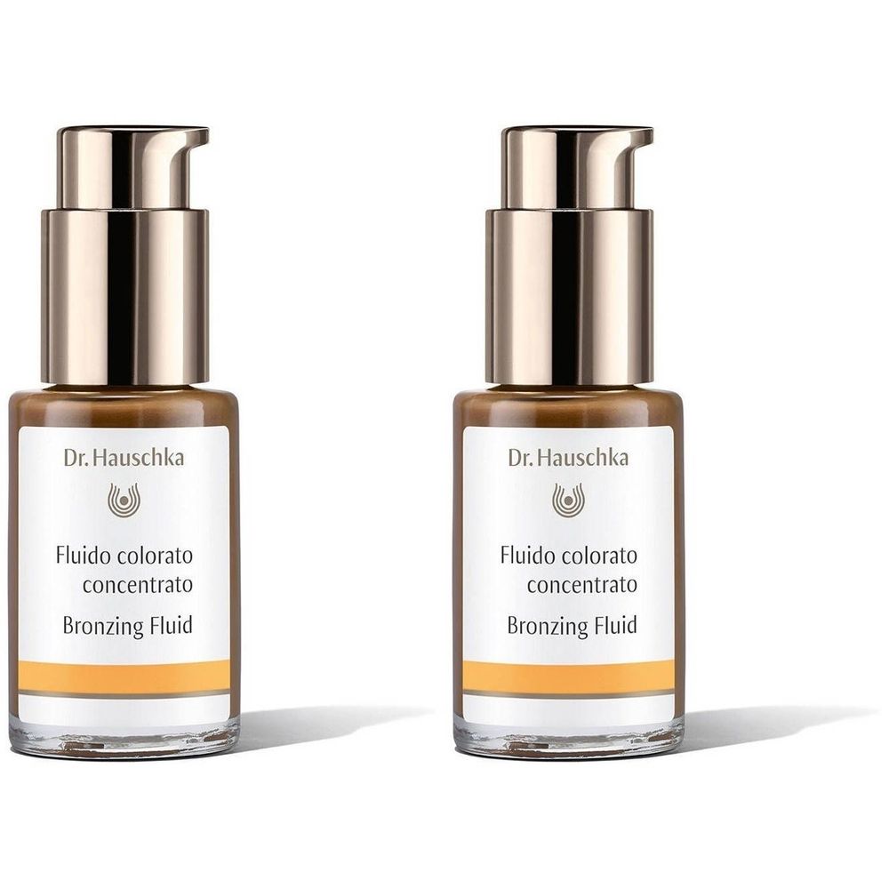 Deux flacons de fluide bronzant. Inscription : Dr. Hauschka, Fluido colorato concentrato, Bronzing Fluid.