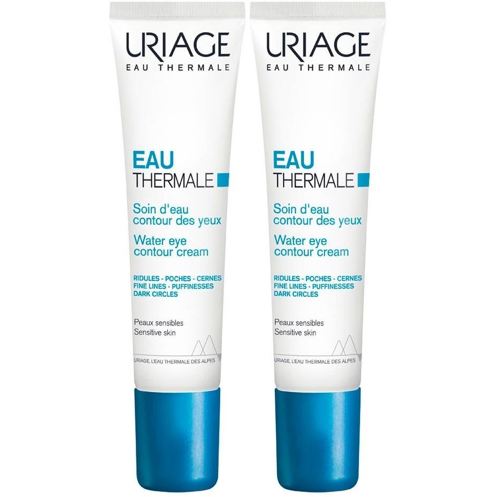 Zwei Tuben Uriage Eau Thermale Augencreme. Weiß mit blauer Kappe. Text: Soin d'eau contour des yeux, Water eye contour cream.
