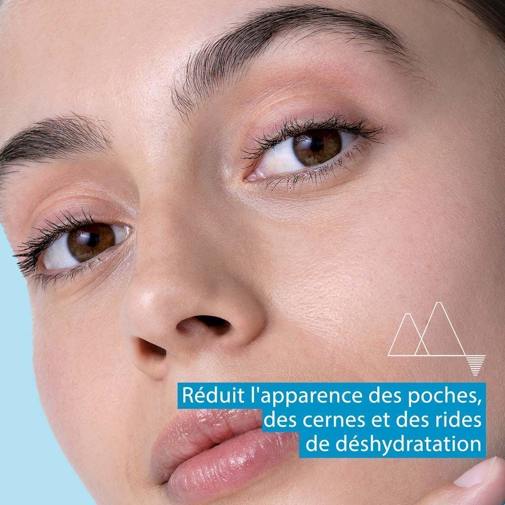 Gros plan sur un visage. Texte : Réduit l'apparence des poches, cernes.