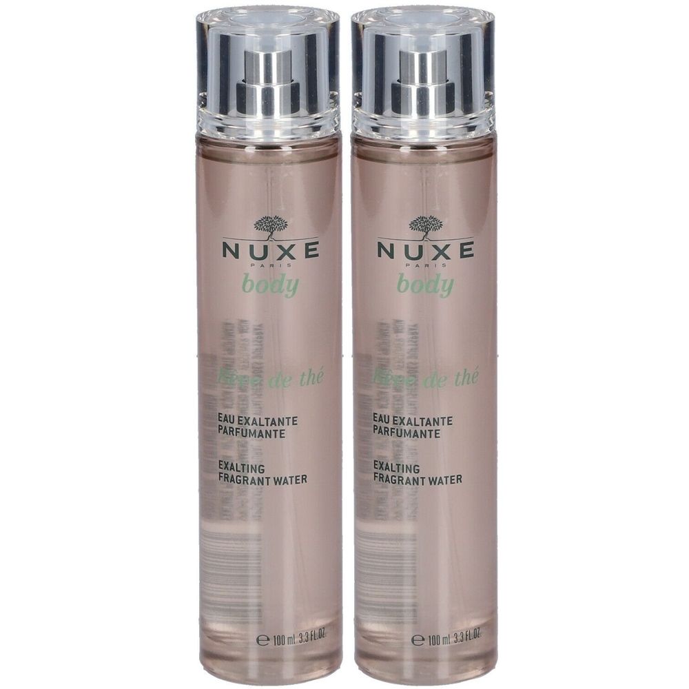 Zwei Flakons mit Sprühkopf. Aufschrift: NUXE body, Eau Exaltante Parfumante, Exalting Fragrant Water.