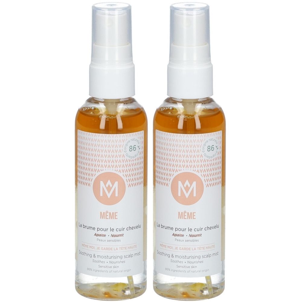 Zwei Sprays mit weißem Sprühkopf und durchsichtiger Flasche. Auf dem Etikett steht "MÊME".