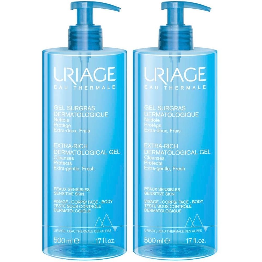 Zwei blaue Flaschen URIAGE Gel Surgras Liquide dermatologique mit Pumpverschluss. Text: Extra-Rich Dermatological Gel, 500 ml.