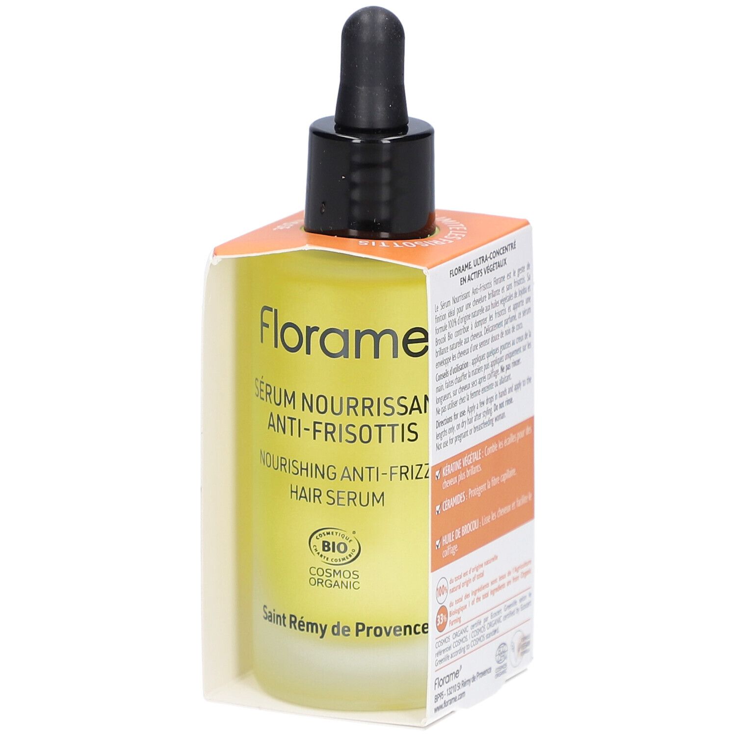 Serumflasche mit schwarzer Pipette in einer orangefarbenen Schachtel. Text auf der Flasche und Schachtel.