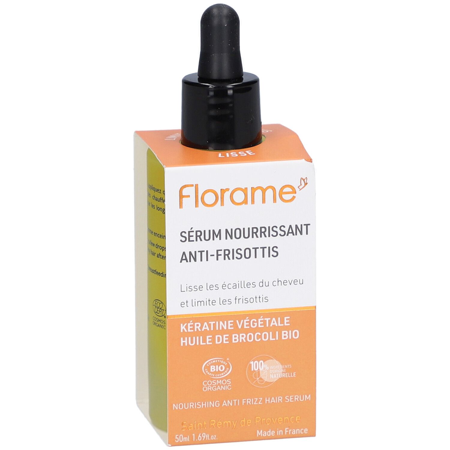 Serumflasche mit schwarzer Pipette in einer orangefarbenen Schachtel. Auf der Schachtel steht "Sérum Nourrissant Anti-Frisottis".