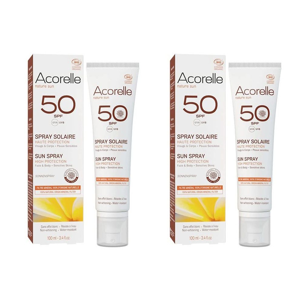 Deux tubes et deux boîtes de crème solaire. Inscription : Acorelle, 50 SPF, Spray Solaire, Sun Spray.