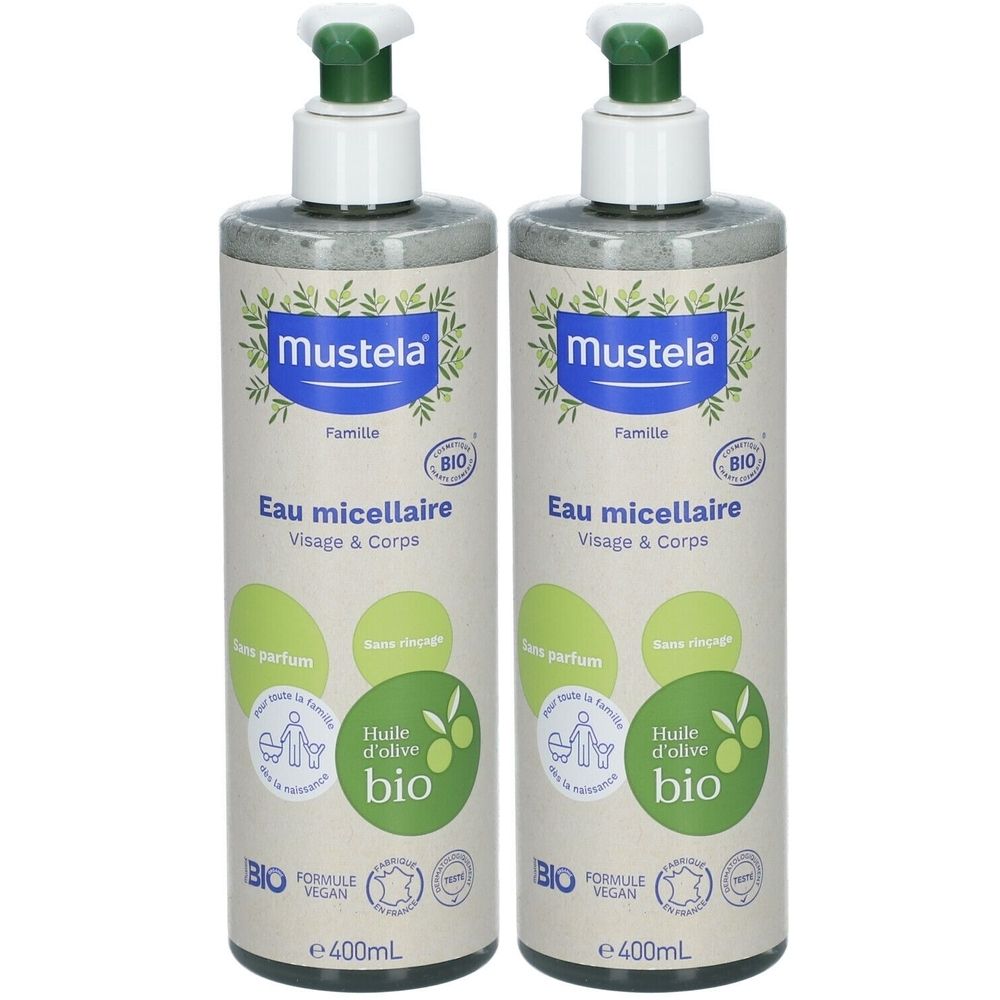Deux flacons de Mustela Eau micellaire. Inscription : BIO, Visage & Corps, sans parfum, vegan. Emballage vert et blanc.