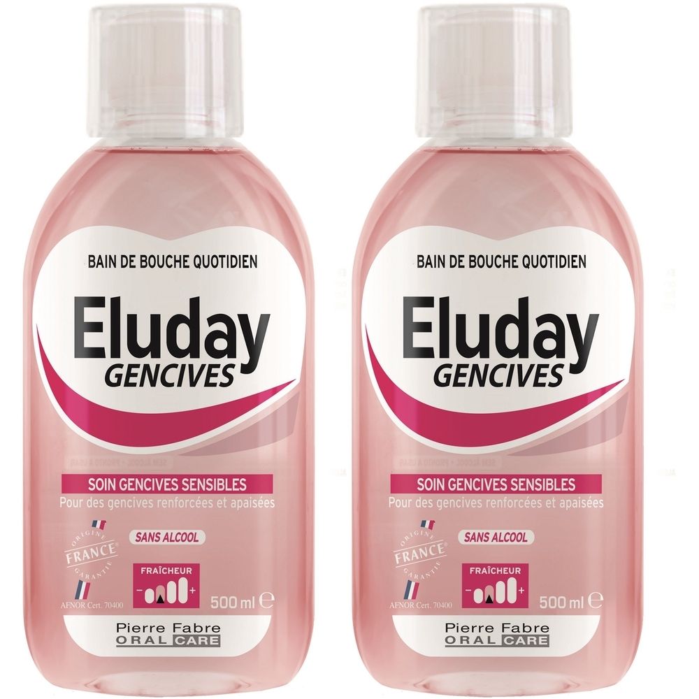 Zwei Flaschen Mundspülung. Rosa Flüssigkeit, weißer Deckel. Aufschrift: Eluday Gencives, Soin Gencives Sensibles, Sans Alcool, 500 ml.