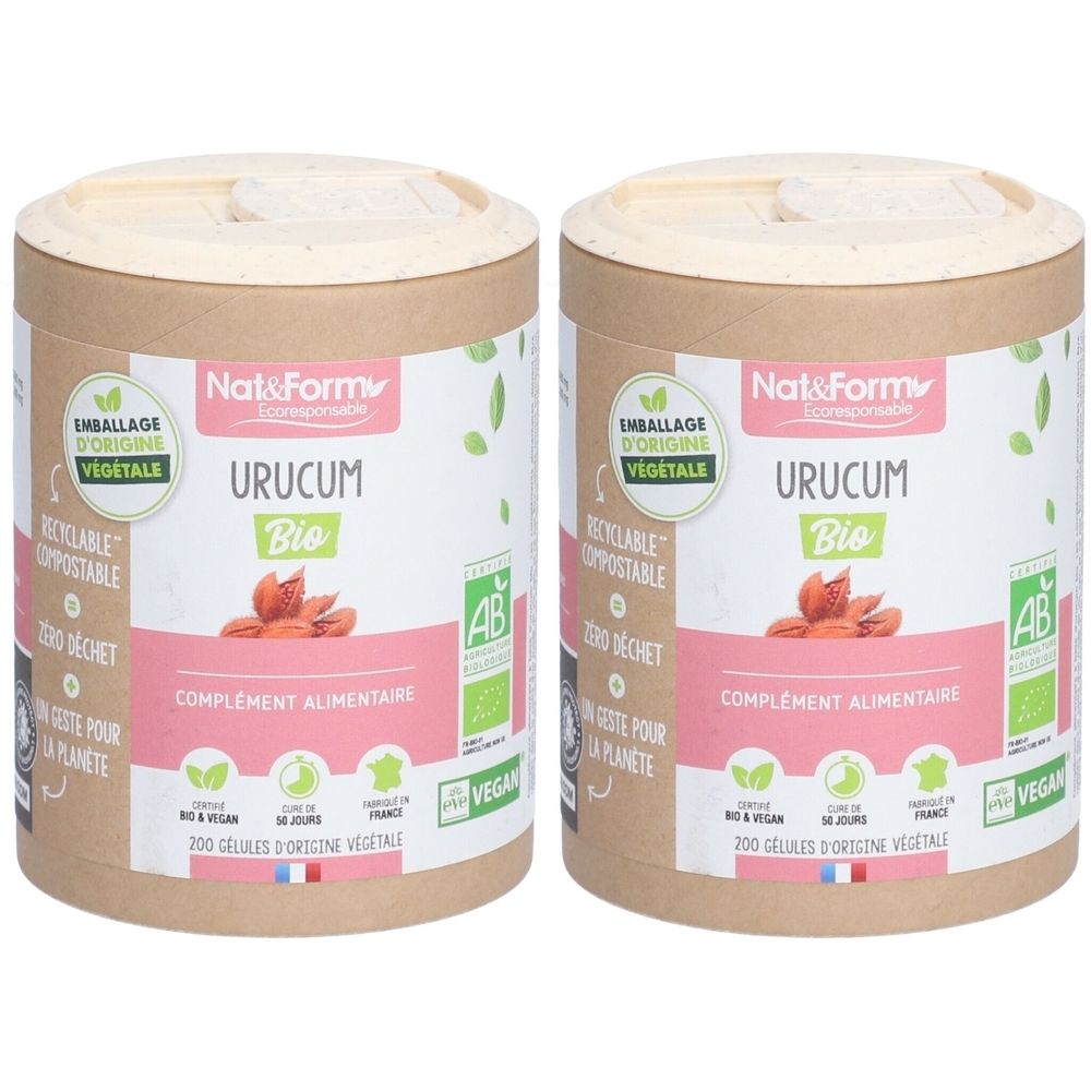 Deux boîtes cylindriques en carton brun. Inscription : Urucum Bio, complétée par des logos et du texte. Certification Vegan et AB.