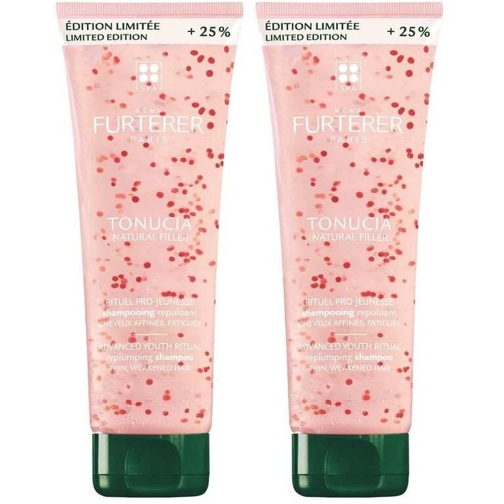 Deux tubes de shampooing. Teinte rose avec points rouges. Texte: FURTERER, TONUCIA, ÉDITION LIMITÉE, +25%. Bouchon vert.