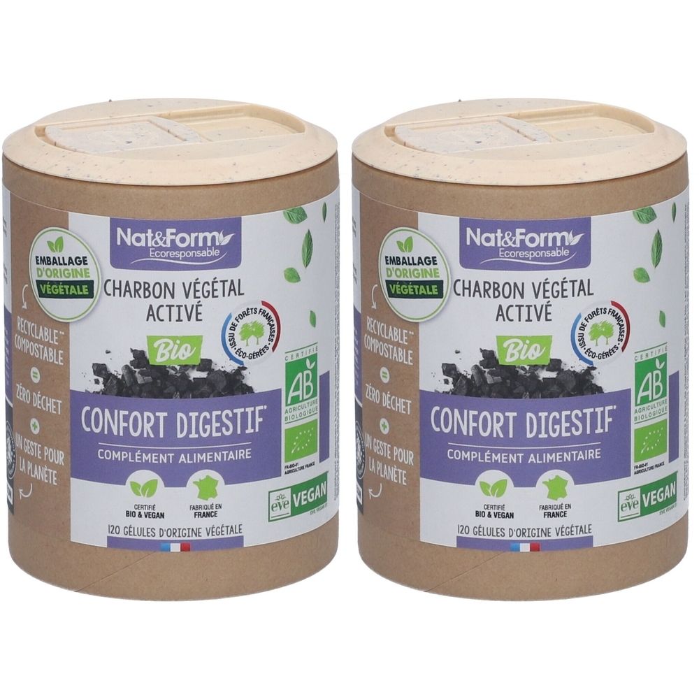 Deux boîtes cylindriques avec couvercles. Inscription: Charbon végétal activé, Confort digestif, Bio, Vegan. Emballage en fibres végétales.