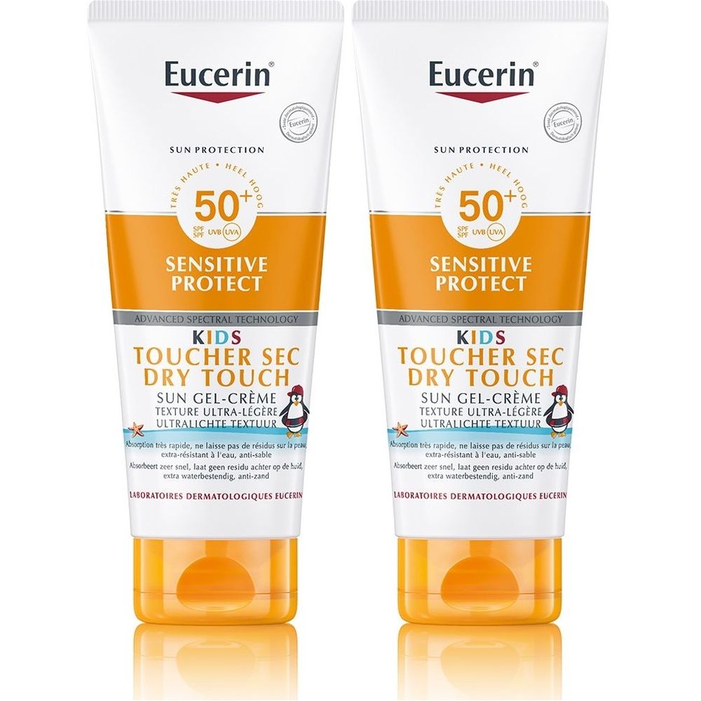 Deux tubes de crème solaire Eucerin SPF 50+. Inscription: Sensitive Protect Kids, Toucher Sec Dry Touch. Texture ultra-légère.