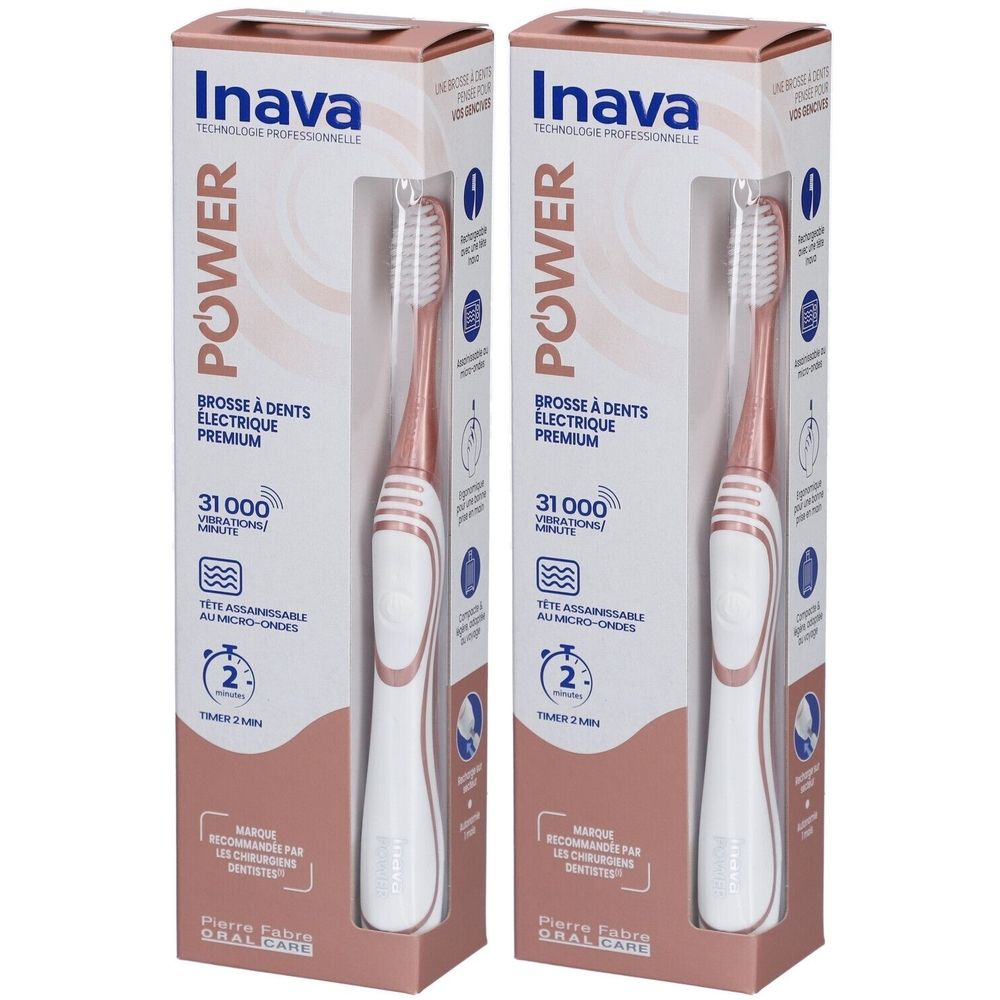 Deux brosses à dents électriques dans des emballages. Têtes de brosse rose doré, manches blancs. Emballage avec nom et détails du produit.