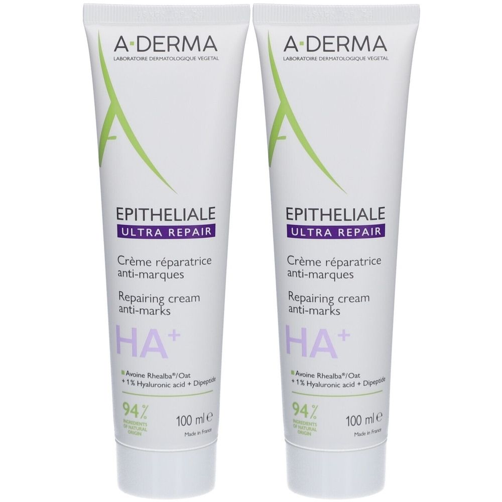 Deux tubes de A-DERMA Epitheliale Ultra Repair. Tubes blancs avec accents verts et violets. Texte: Crème réparatrice anti-marques.
