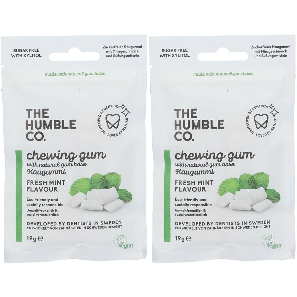Zwei Packungen Kaugummi. Marke: The Humble Co. Aufschrift: Fresh Mint Flavour. Vegan. 19g. Zuckerfrei mit Xylitol.