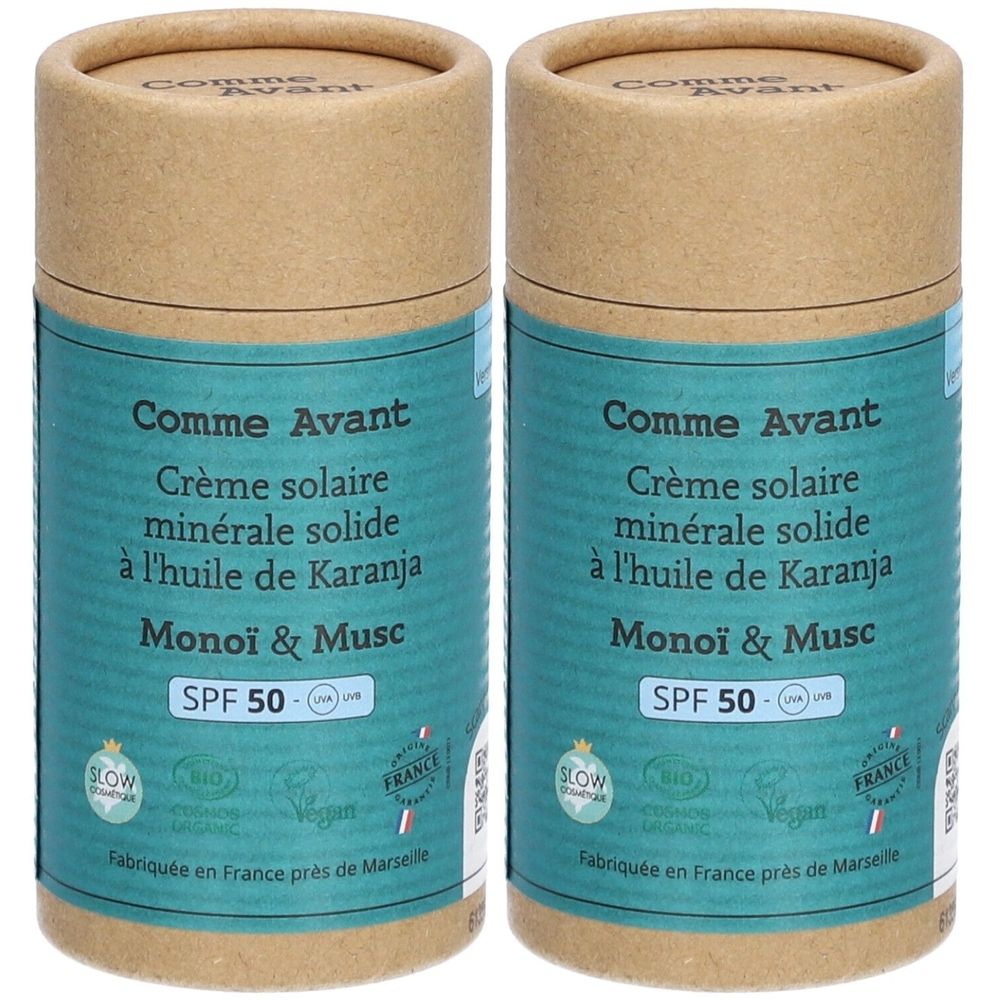 Deux tubes cylindriques de crème solaire. Inscription: Comme Avant, Crème solaire minérale solide, SPF 50. Labels bio et vegan.
