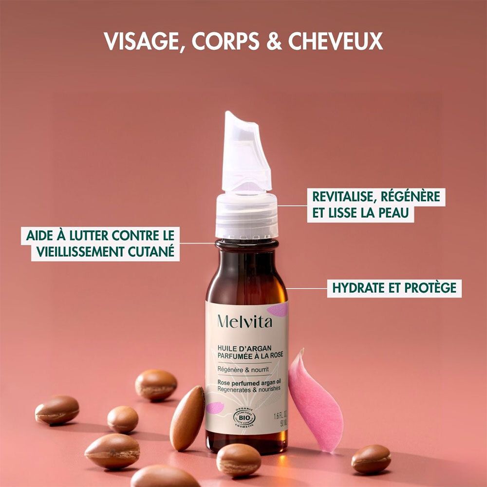Produktflasche mit Arganöl und Rosenblättern. Text: Visage, Corps & Cheveux. Textboxen: Revitalisiert, regeneriert, hydratisiert.