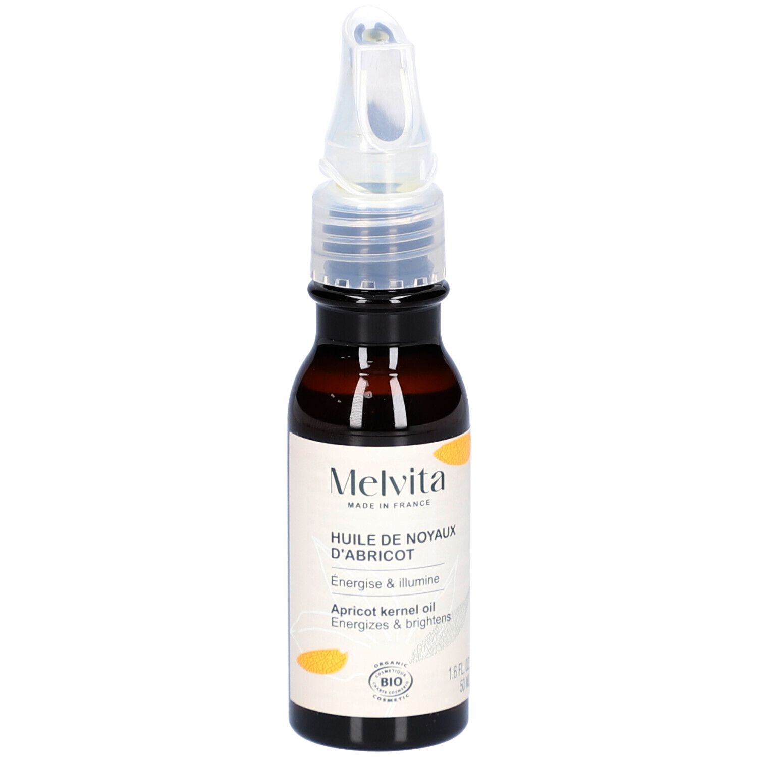 Braune Glasflasche mit Dosieraufsatz. Aufschrift: MELVITA, Huile de Noyaux d'Abricot, Apricot kernel oil. Bio-Siegel.