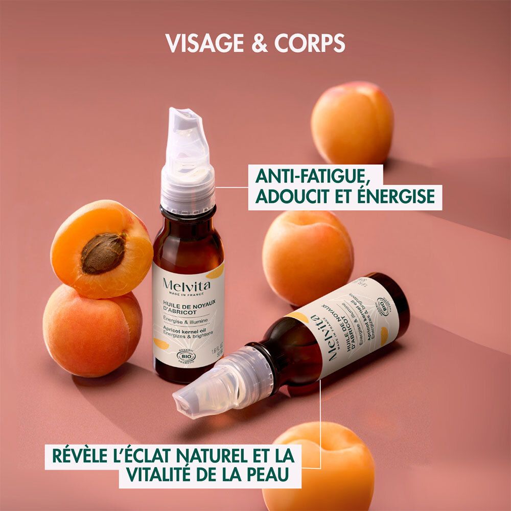 Melvita Bio-Aprikosenkernöl-Flasche und Aprikosen. Text: Visage & Corps. Textboxen: Anti-Fatigue, Adoucit et Énergise.