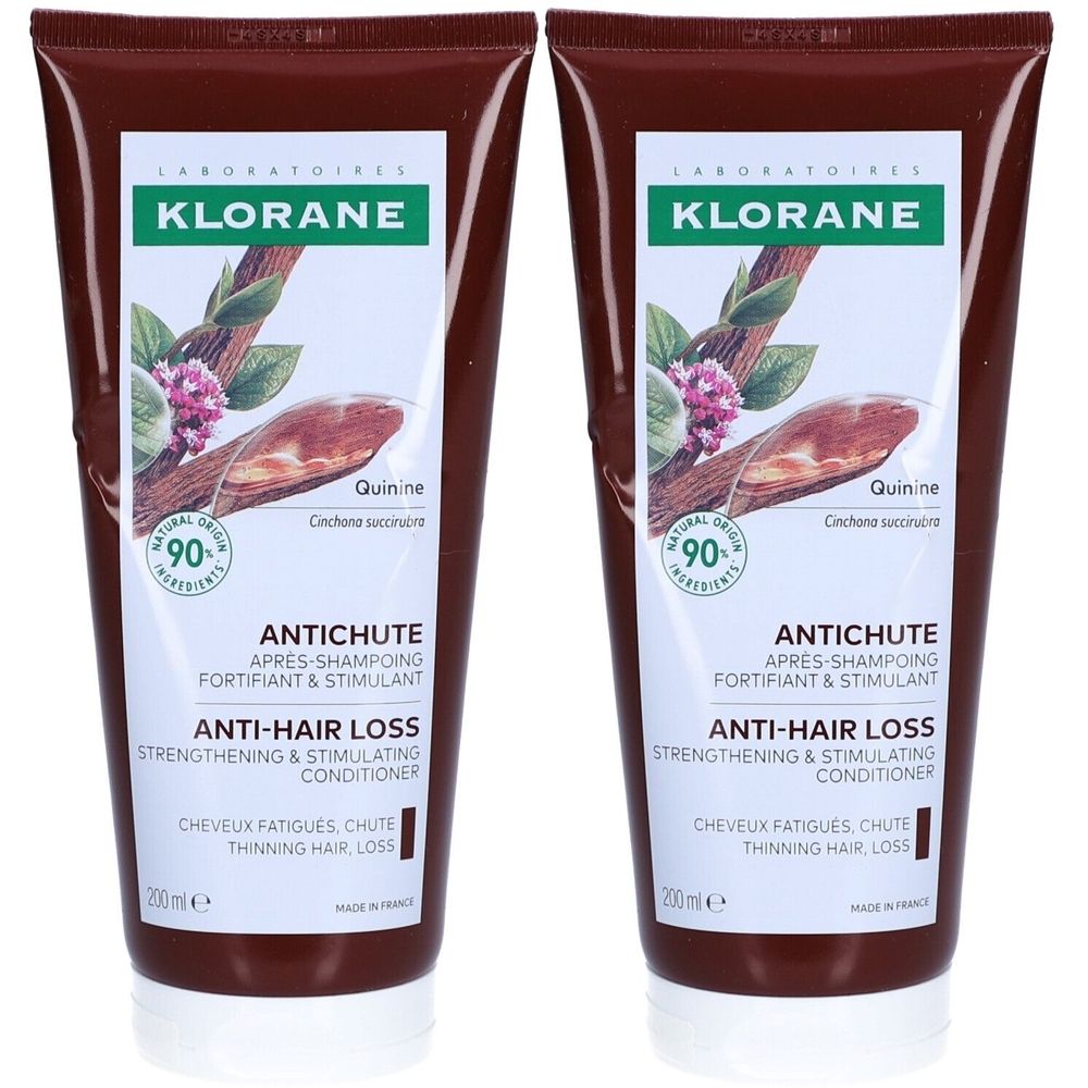 Deux tubes bruns de KLORANE Après-Shampoing Fortifiant & Stimulant. Inscription: Antichute, Anti-chute de cheveux. Contient 90% d'ingrédients d'origine naturelle.
