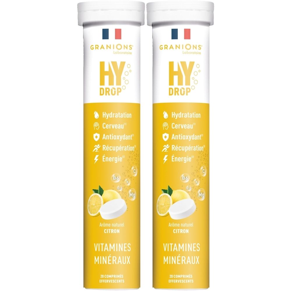 Zwei Tuben GRANIONS HY DROP. Gelbe Verpackung mit Produktinformationen und Zitronen-Illustrationen. Enthält Brausetabletten.