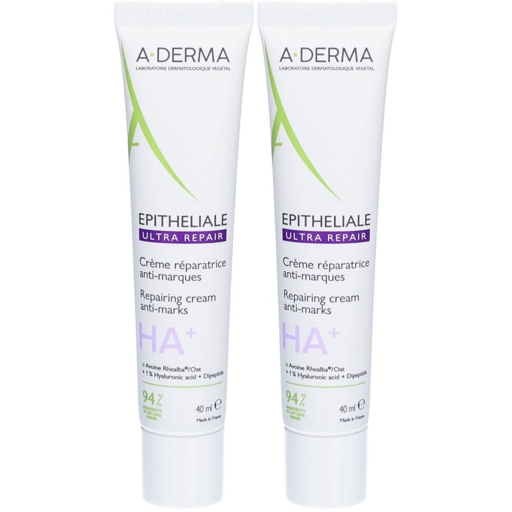 Deux tubes de crème A-DERMA Epitheliale A.H Ultra Repair. Tubes blancs avec accents verts et violets. Texte : Crème réparatrice anti-marques.
