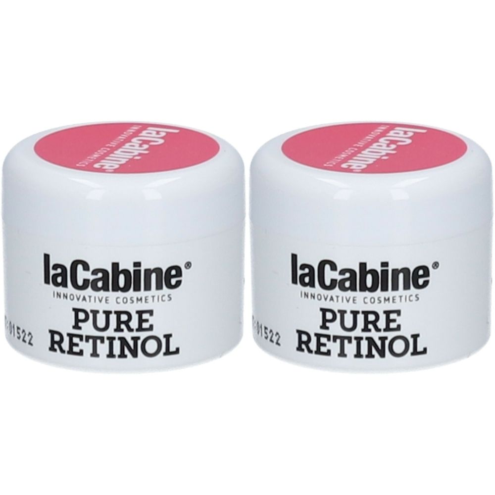 Deux pots blancs avec couvercles roses. On peut lire "laCabine Pure Retinol" sur les pots.