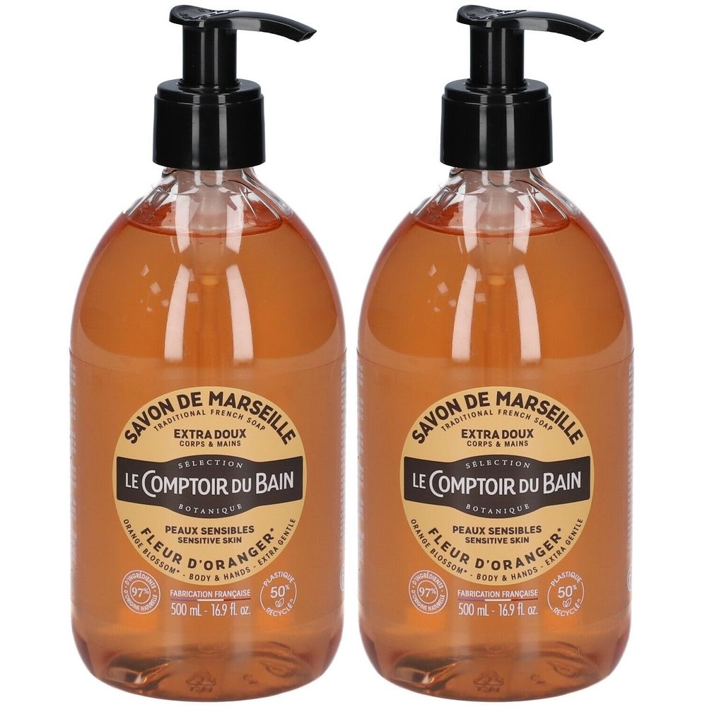 Deux flacons de savon liquide avec pompe noire. Inscription: Savon de Marseille, Fleur d'oranger, Le Comptoir du Bain.