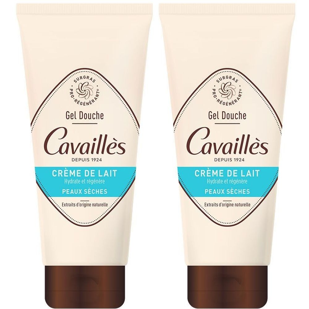 Zwei Tuben Rogé Cavaillès Gel Douche Crème de lait. Beige-braune Tuben mit blauer Schrift. Aufschrift: Crème de Lait, Peaux Sèches.