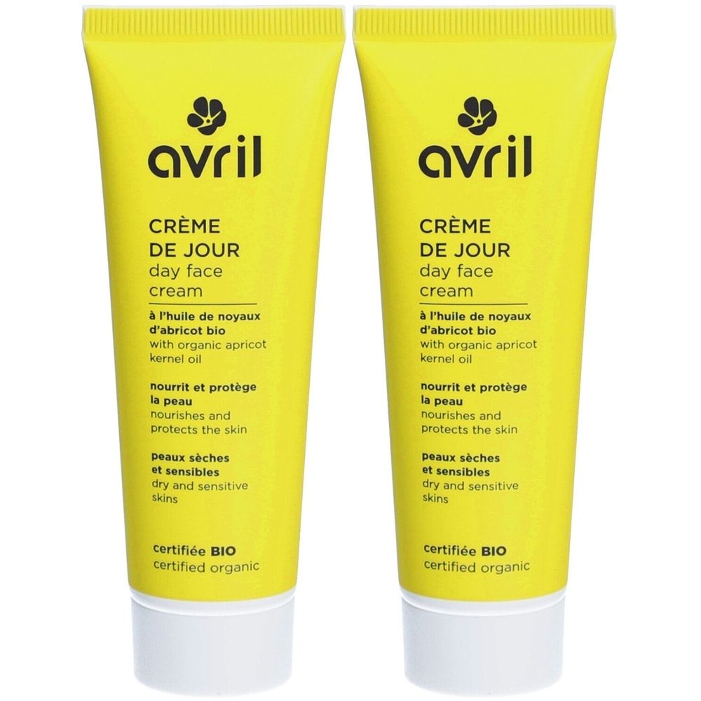 Deux tubes de crème jaune. Inscription: Avril Crème de Jour, à l'huile de noyau d'abricot bio. Pour peaux sèches et sensibles.