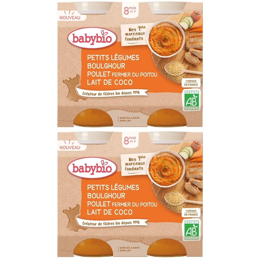 Verpackung mit Babybio-Babynahrung. Aufschrift: PETITS LÉGUMES BOULGHOUR POULET FERMIER DU POITOU LAIT DE COCO. Bio-Siegel.