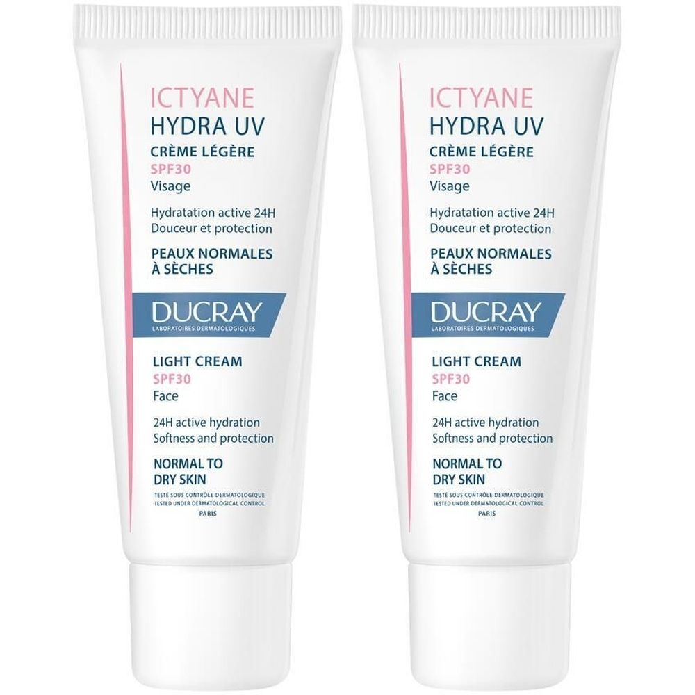 Zwei Tuben Ictyane Hydra UV Crème légère visage SPF30. Weiße Tuben mit rosa und blauer Beschriftung. Text: Ducray, Light Cream, SPF30.
