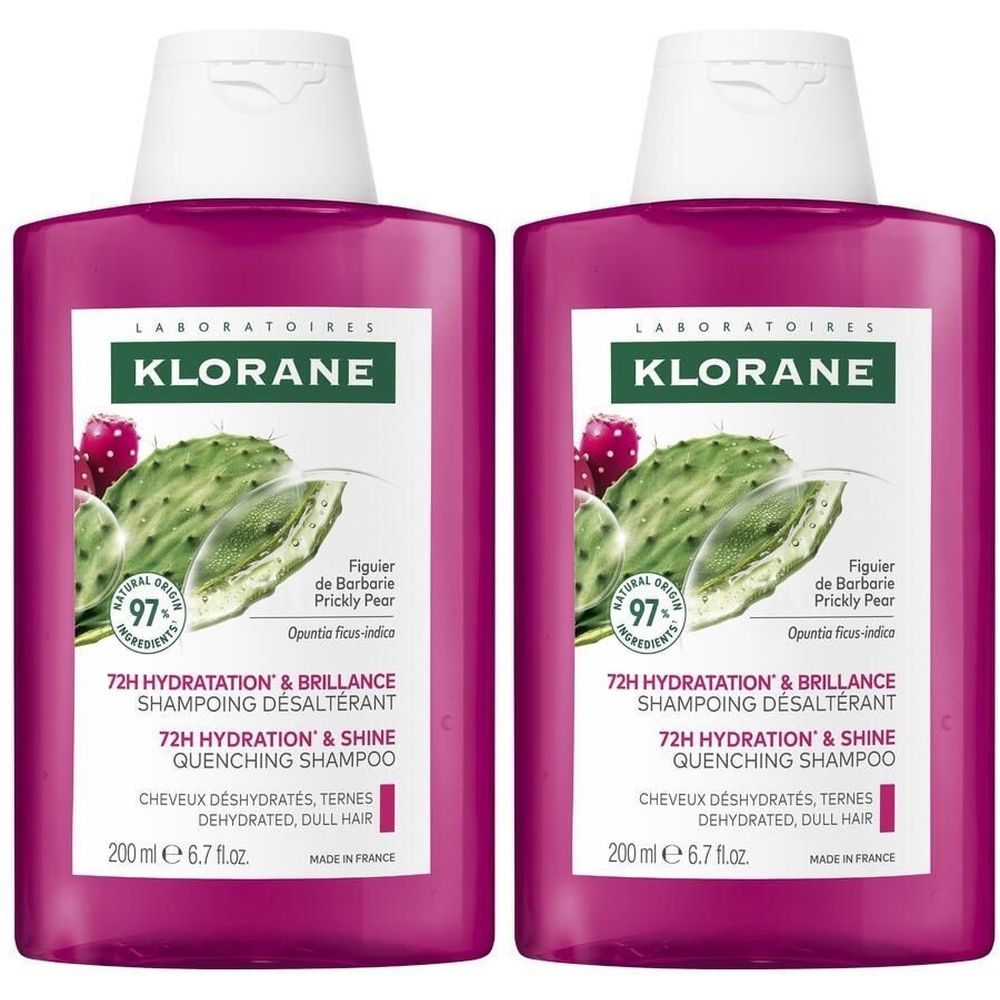 Deux flacons de shampooing Klorane. Inscription: 72H Hydratation & Brillance. Illustration de figue de Barbarie. Flacons roses, bouchons blancs.