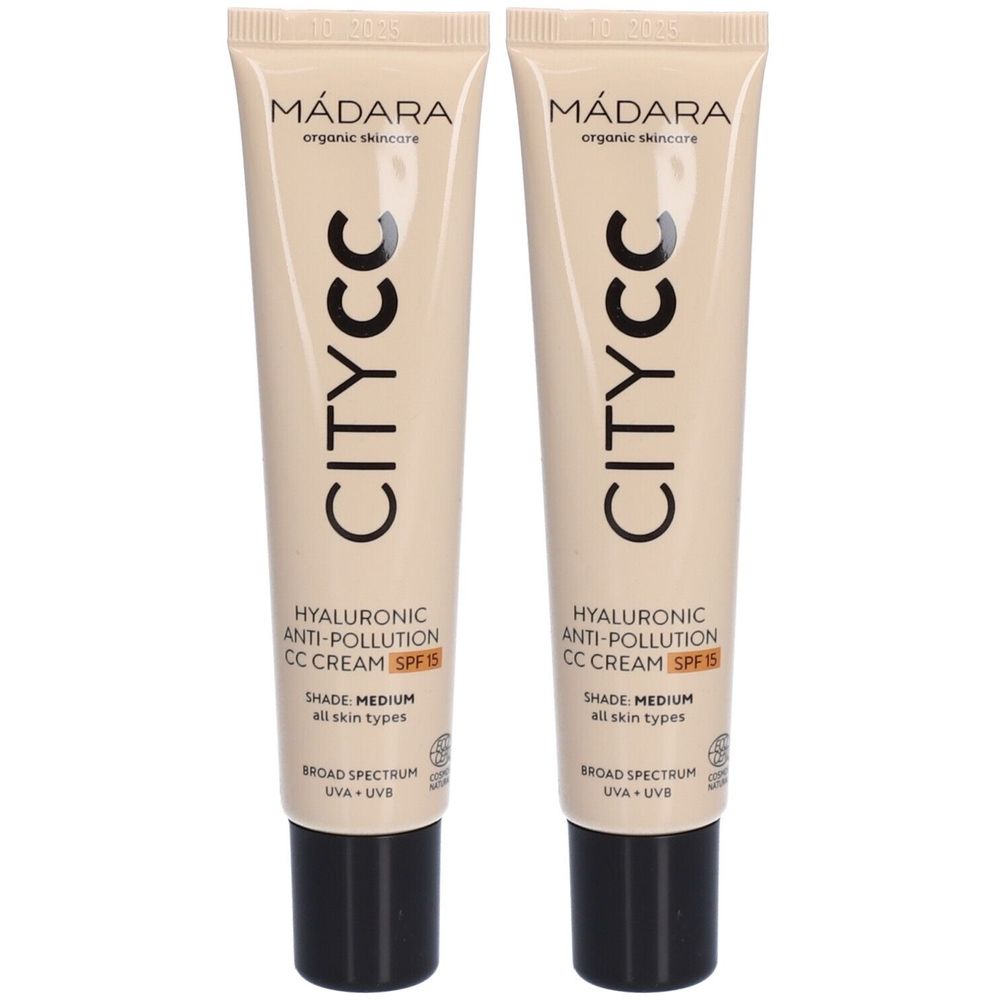 Zwei Tuben Mádara CITY CC Anti-Pollution CC Cream SPF 15. Beige Tuben mit schwarzem Verschluss. Text: CITY CC, Hyaluronsäure, SPF 15.
