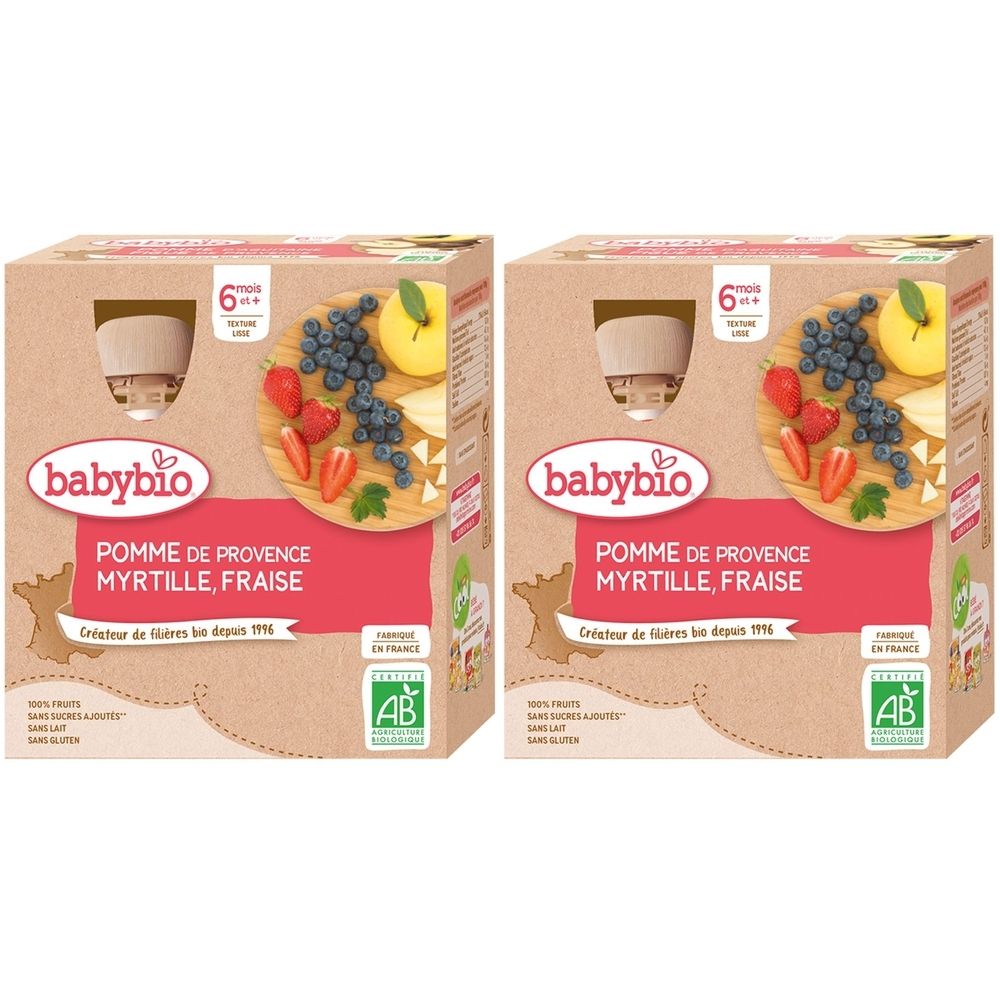 Deux boîtes Babybio. Inscription : POMME DE PROVENCE MYRTILLE, FRAISE. Label bio. Convient aux bébés dès 6 mois.