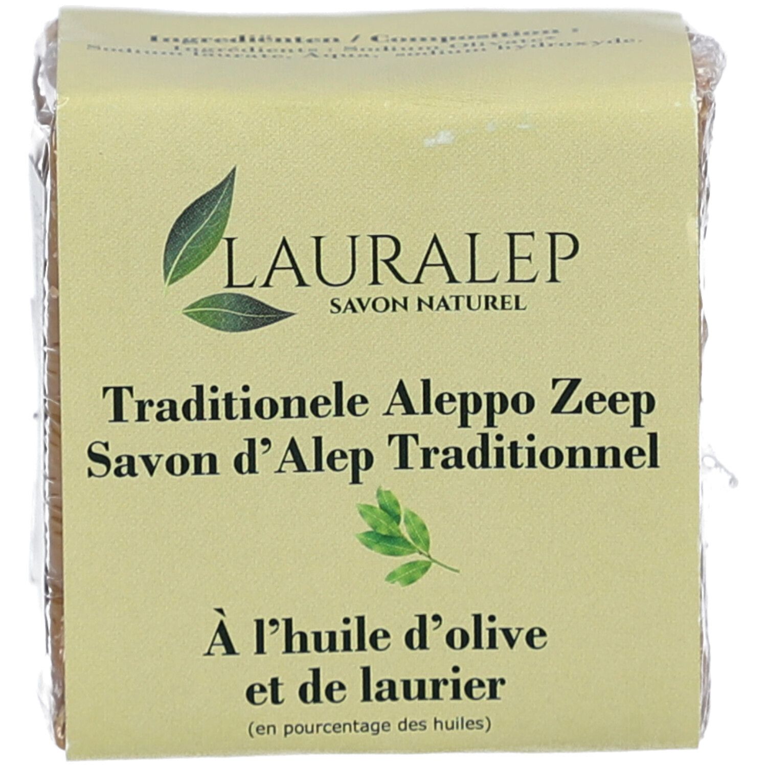 Savon carré emballé. Inscription: LAURALEP, Savon Naturel. Texte: Traditionelle Aleppo Zeep, Savon d'Alep Traditionnel, à l'huile d'olive.