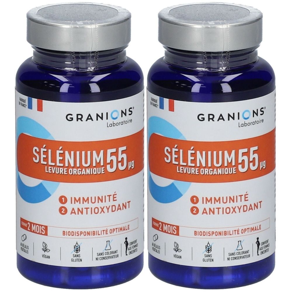 Deux flacons de Laboratoire des Granions® Sélénium. Flacons bleus avec bouchons argentés et étiquettes oranges. Inscription : Sélénium 55 µg.